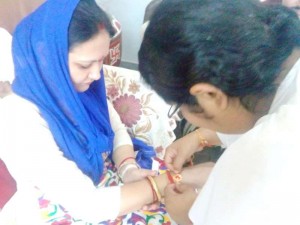 B.K. Preeti Tying Rakhi to Chhatarpur Nagar Palika Adhyaksh Archna Singh